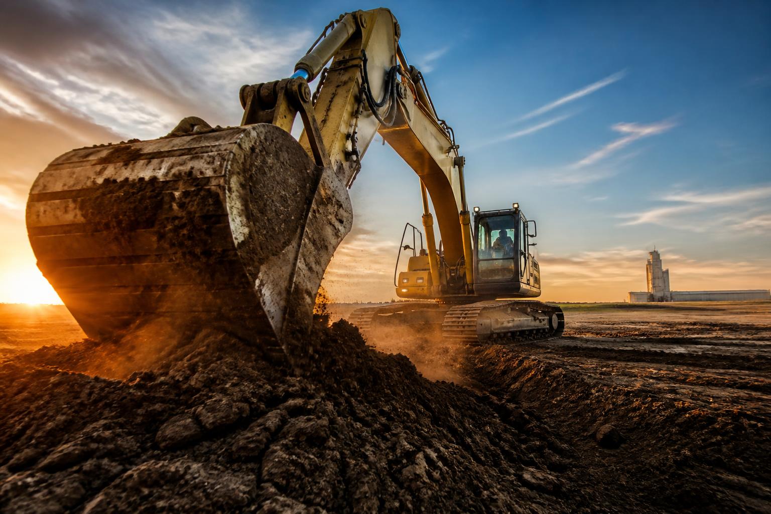 Excavator working on a Grande Prairie acreage